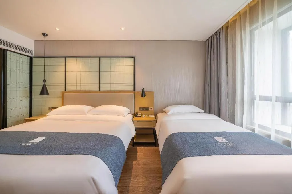 Bed in Echarm Hotel Nanchang Hongcheng Wangfujing