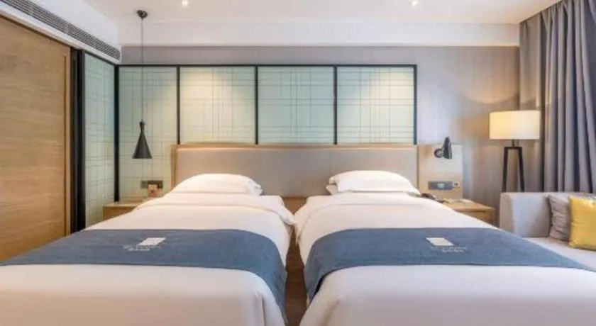 Bed in Echarm Hotel Nanchang Hongcheng Wangfujing