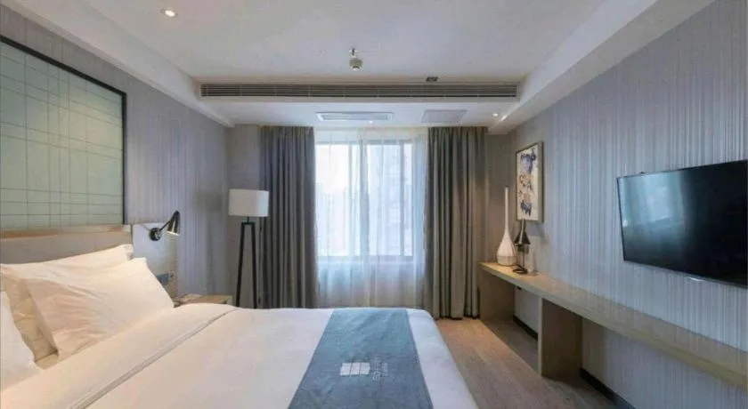 Bed in Echarm Hotel Nanchang Hongcheng Wangfujing