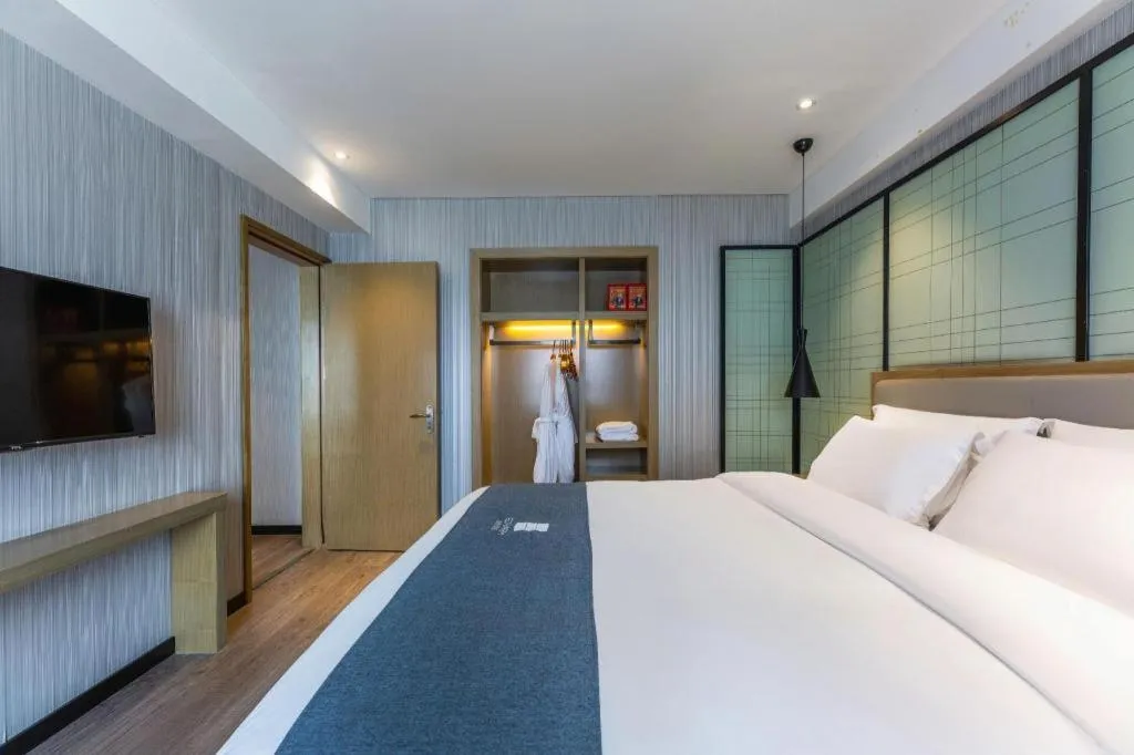 Bed in Echarm Hotel Nanchang Hongcheng Wangfujing