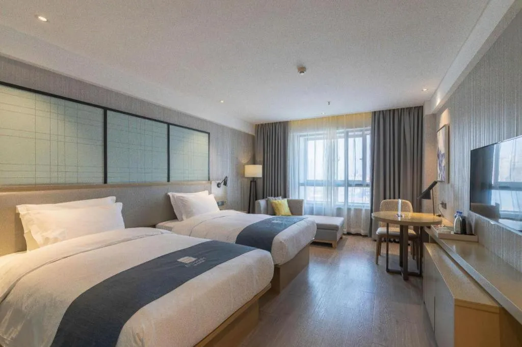 Bed in Echarm Hotel Nanchang Hongcheng Wangfujing