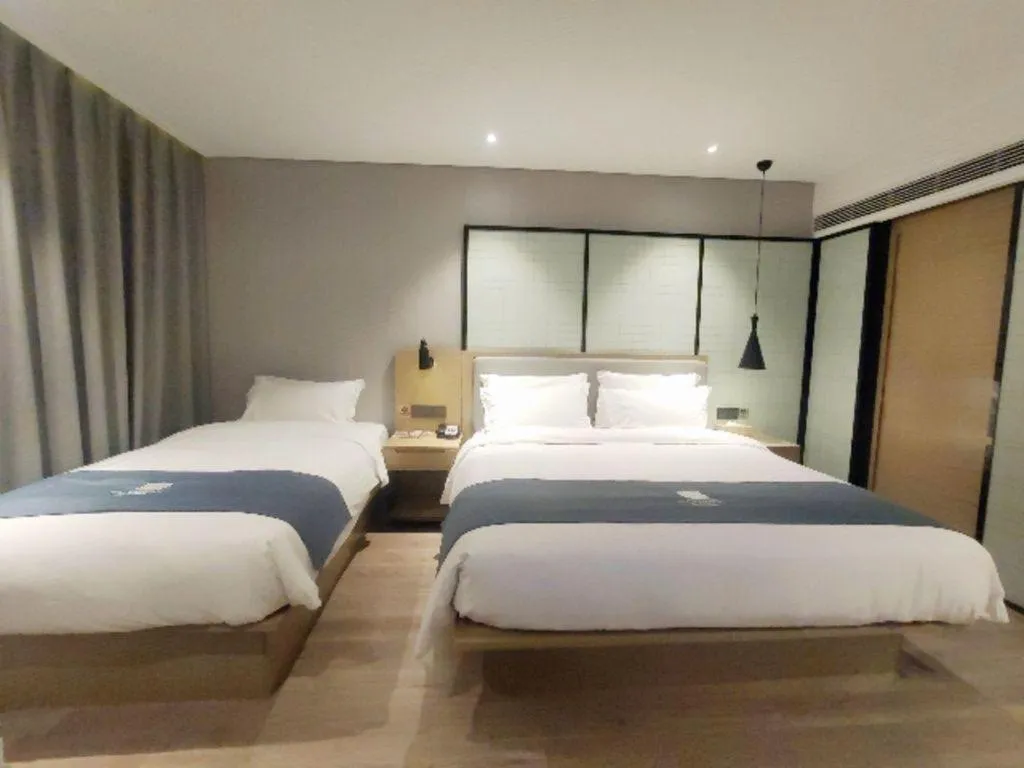 Bed in Echarm Hotel Nanchang Hongcheng Wangfujing