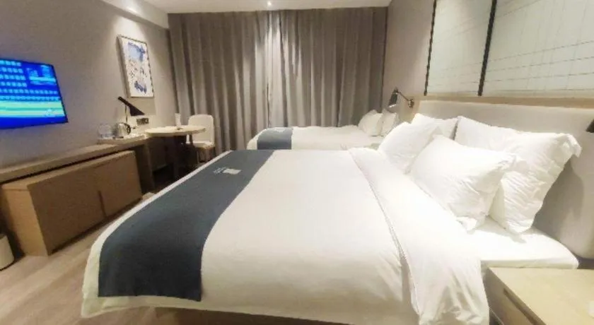 Bed in Echarm Hotel Nanchang Hongcheng Wangfujing