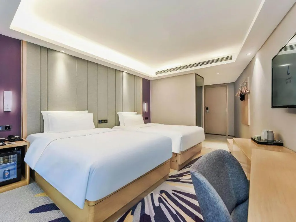 Bed in Lavande Hotel·Xishuangbanna Jinghong Songkran Square