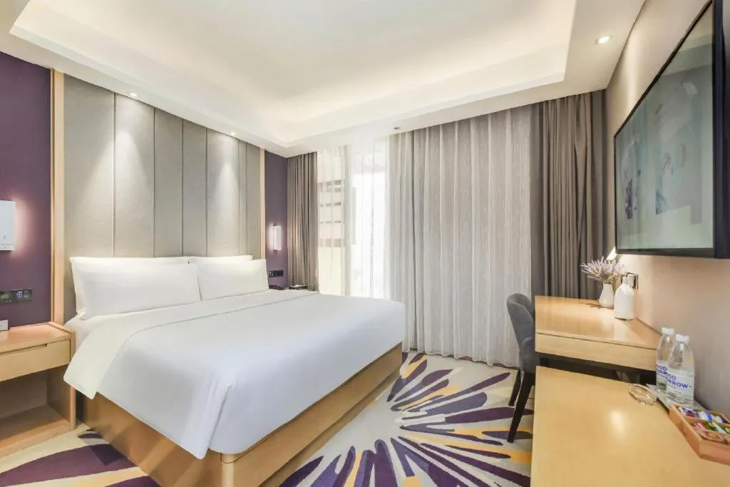 Bed in Lavande Hotel·Xishuangbanna Jinghong Songkran Square