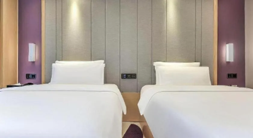 Bed in Lavande Hotel·Xishuangbanna Jinghong Songkran Square