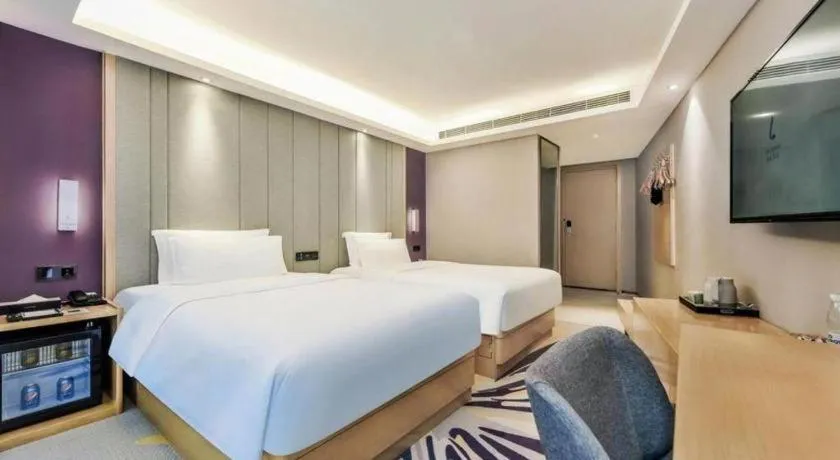 Bed in Lavande Hotel·Xishuangbanna Jinghong Songkran Square