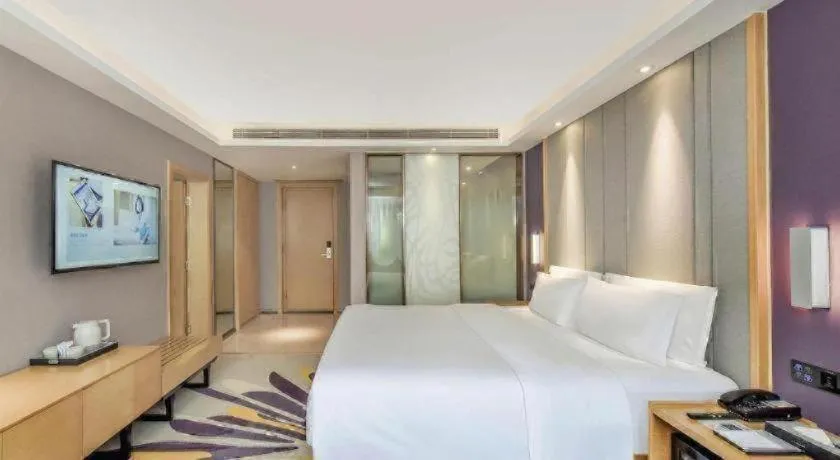 Bed in Lavande Hotel·Xishuangbanna Jinghong Songkran Square