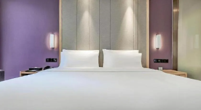 Bed in Lavande Hotel·Xishuangbanna Jinghong Songkran Square