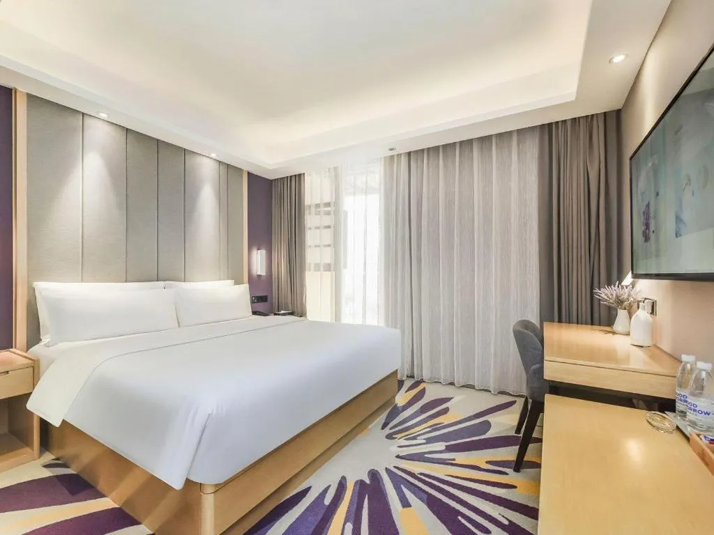 Bed in Lavande Hotel·Xishuangbanna Jinghong Songkran Square