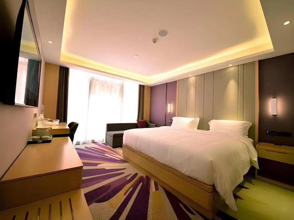 Bed in Lavande Hotel·Xishuangbanna Jinghong Songkran Square