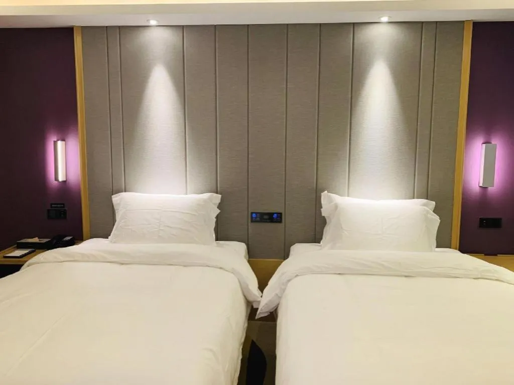 Bed in Lavande Hotel·Xishuangbanna Jinghong Songkran Square