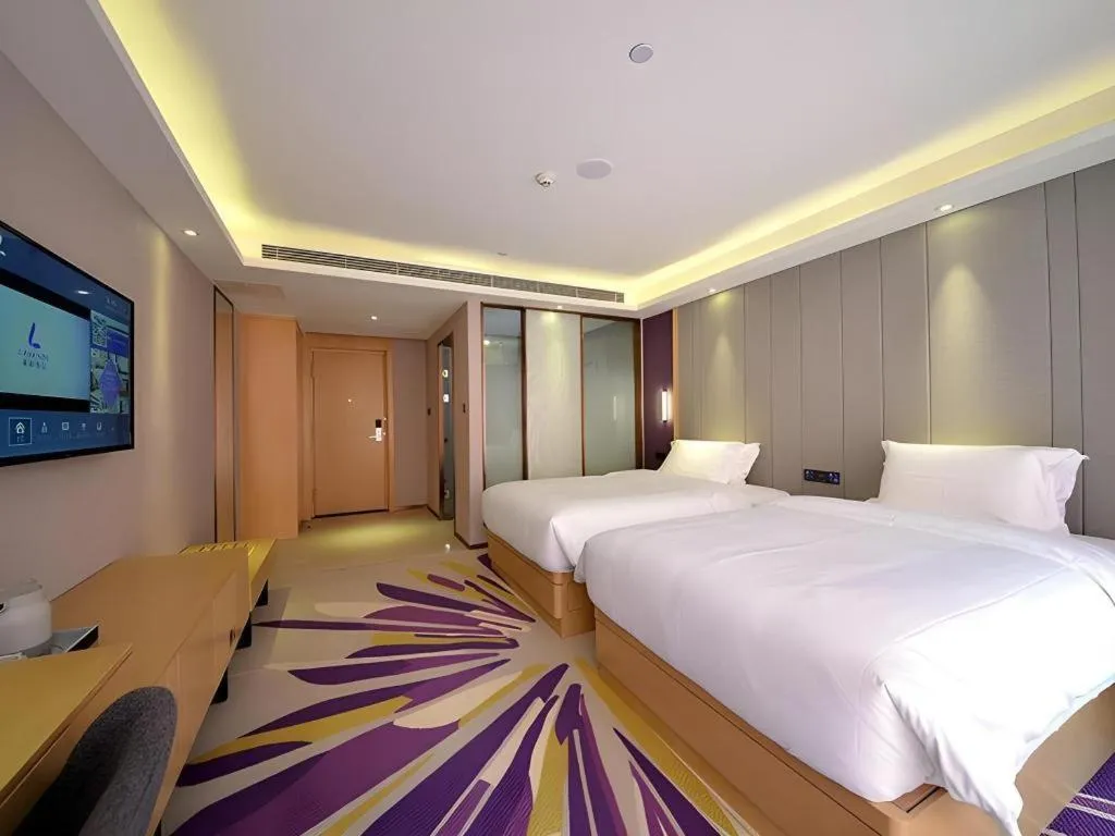 Bed in Lavande Hotel·Xishuangbanna Jinghong Songkran Square