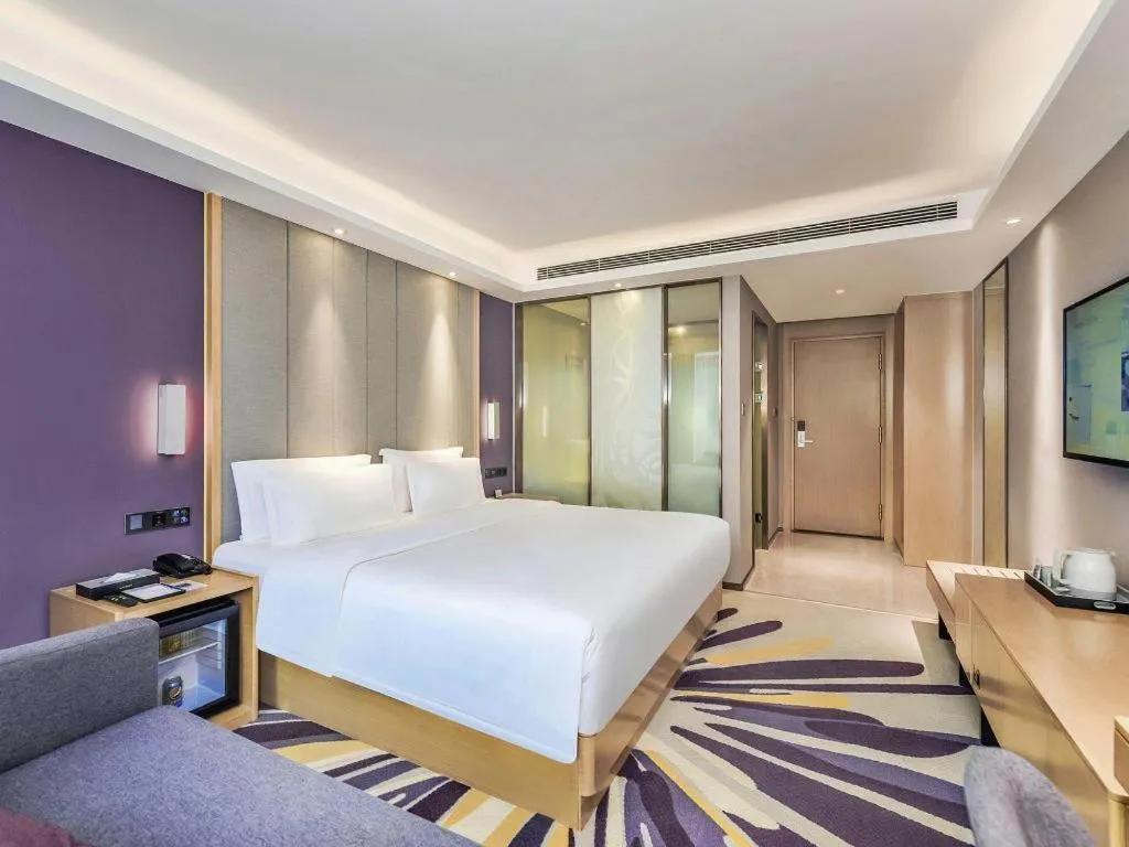 Bed in Lavande Hotel·Xishuangbanna Jinghong Songkran Square