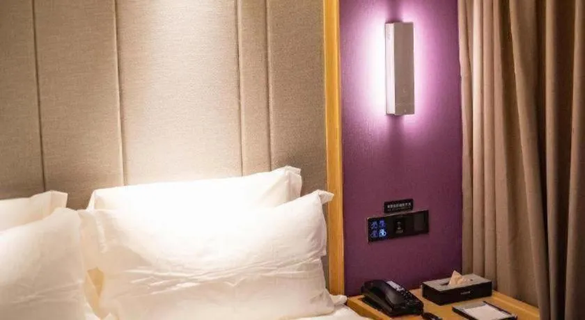 Bed in Lavande Hotel·Xishuangbanna Jinghong Songkran Square