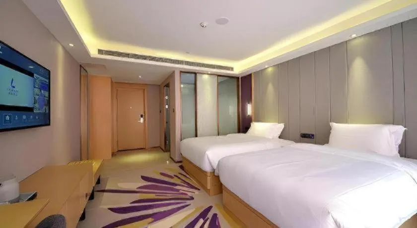 Bed in Lavande Hotel·Xishuangbanna Jinghong Songkran Square