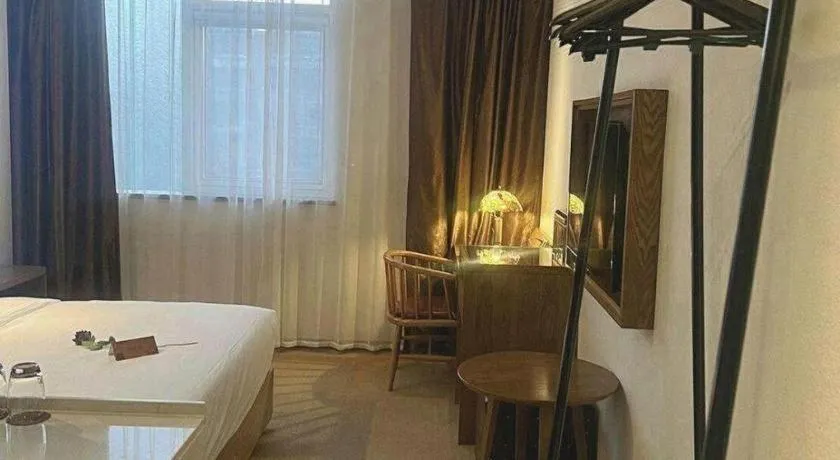 Bed in James Joyce Coffetel Beijing Yizhuang Rongjing East Street Subway Station