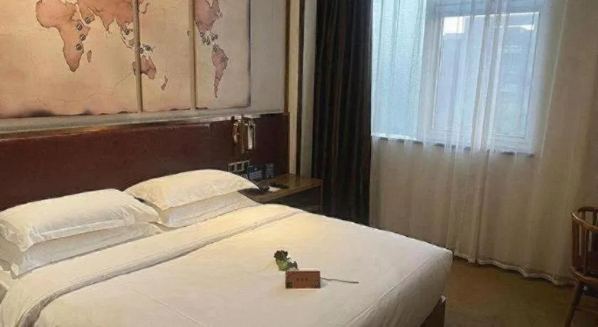 Bed in James Joyce Coffetel Beijing Yizhuang Rongjing East Street Subway Station