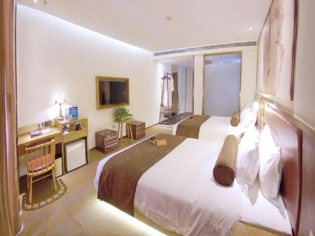 Bed in James Joyce Coffetel Beijing Yizhuang Rongjing East Street Subway Station