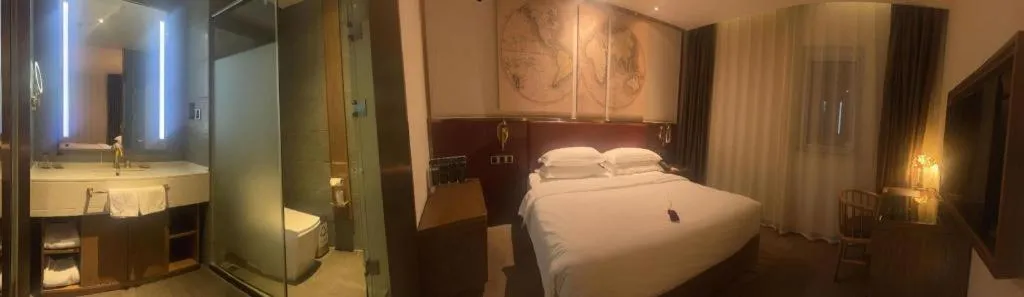 Bed in James Joyce Coffetel Beijing Yizhuang Rongjing East Street Subway Station