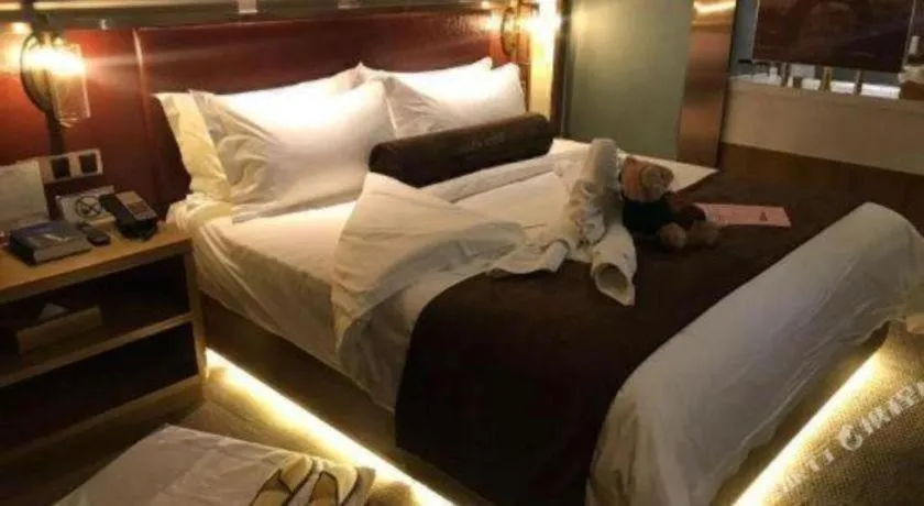 Bed in James Joyce Coffetel Beijing Yizhuang Rongjing East Street Subway Station