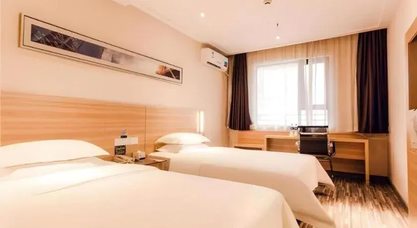 Bed in City Comfort Inn Chibi Railway Station Bed in City Comfort Inn Chibi Railway Station