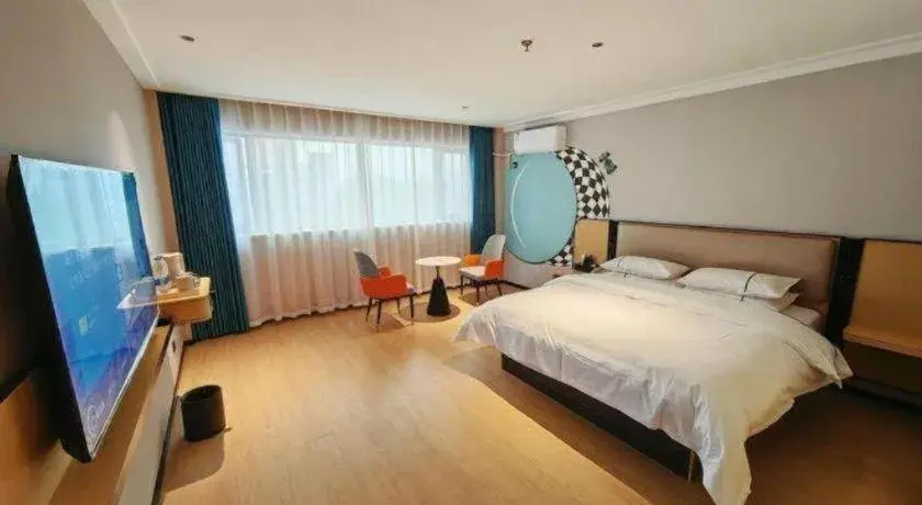 Bed in City Comfort Inn Chibi Railway Station Bed in City Comfort Inn Chibi Railway Station