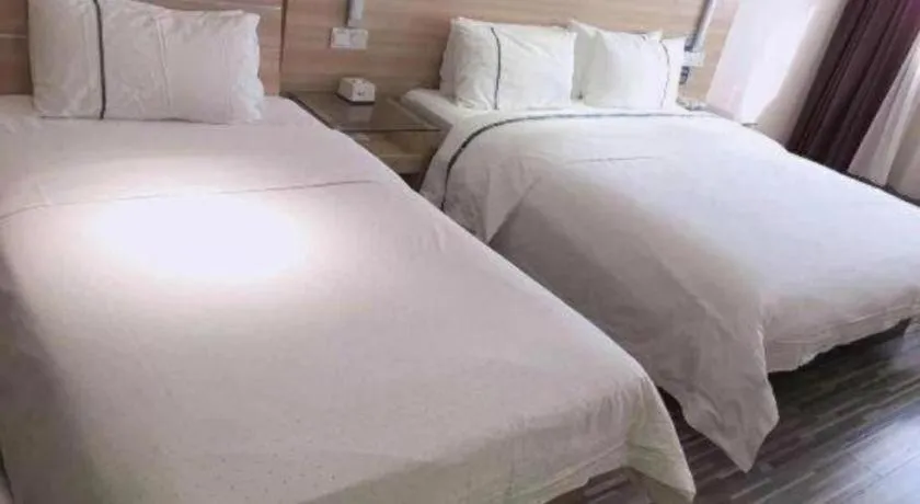 Bed in City Comfort Inn Chibi Railway Station