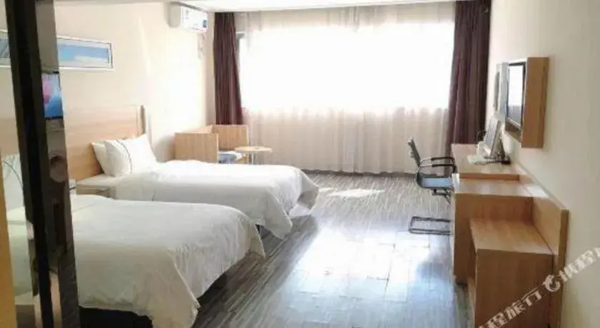 Bed in City Comfort Inn Chibi Railway Station Bed in City Comfort Inn Chibi Railway Station