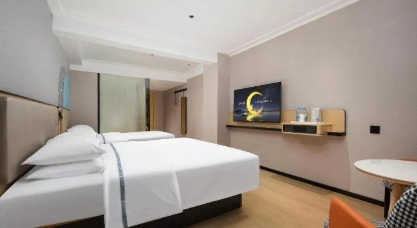 Bed in City Comfort Inn Chibi Railway Station