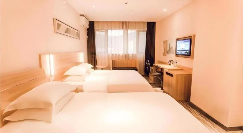 Bed in City Comfort Inn Chibi Railway Station