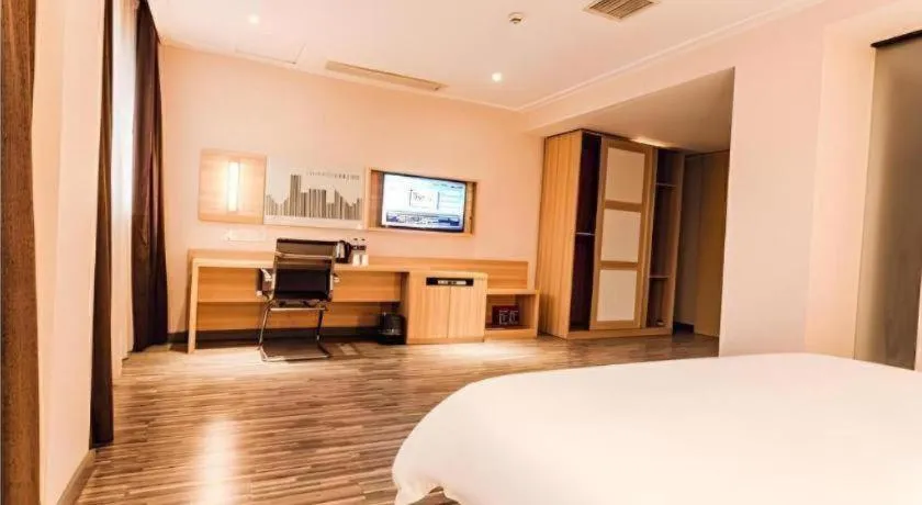 Bed in City Comfort Inn Chibi Railway Station