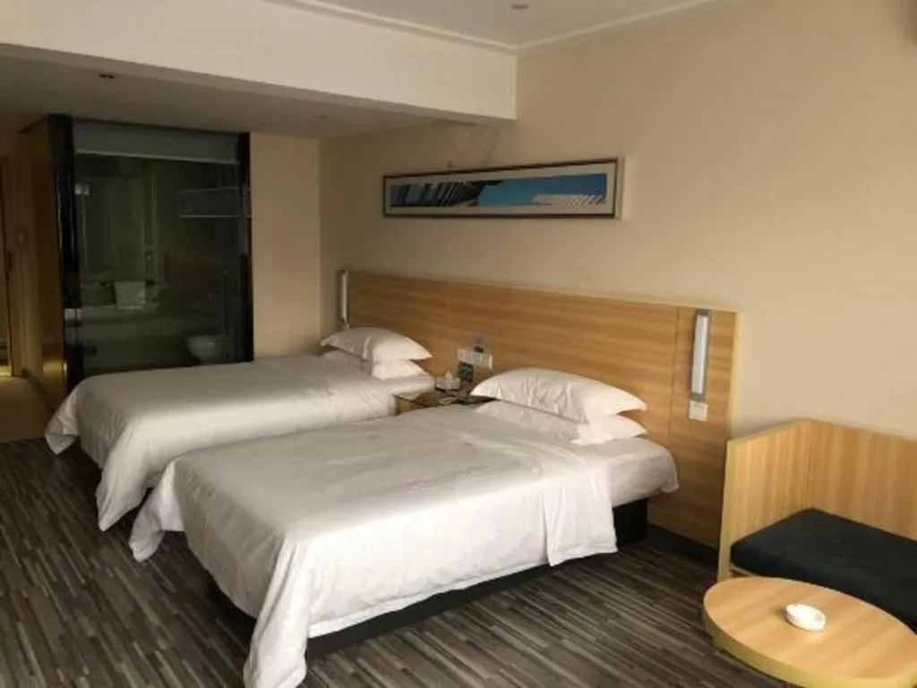 Bed in City Comfort Inn Chibi Railway Station