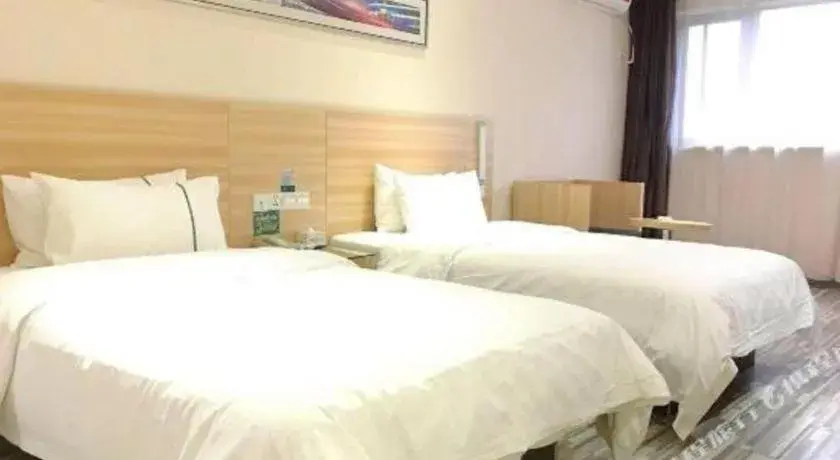 Bed in City Comfort Inn Chibi Railway Station Bed in City Comfort Inn Chibi Railway Station