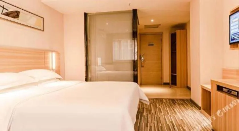 Bed in City Comfort Inn Chibi Railway Station