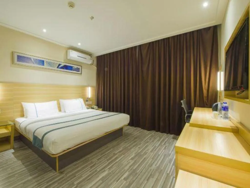 Bed in City Comfort Inn Chibi Railway Station