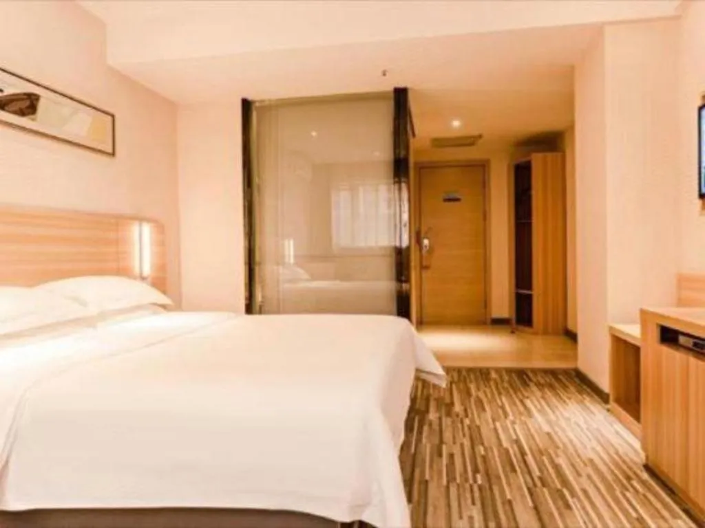 Bed in City Comfort Inn Chibi Railway Station