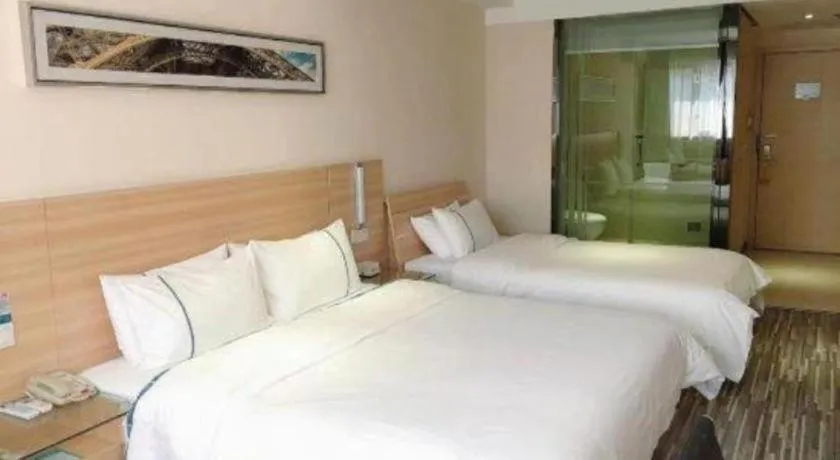 Bed in City Comfort Inn Chibi Railway Station