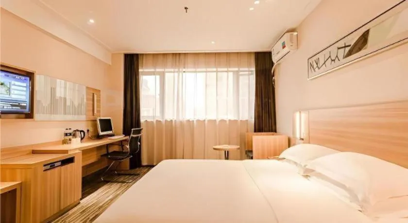 Bed in City Comfort Inn Chibi Railway Station