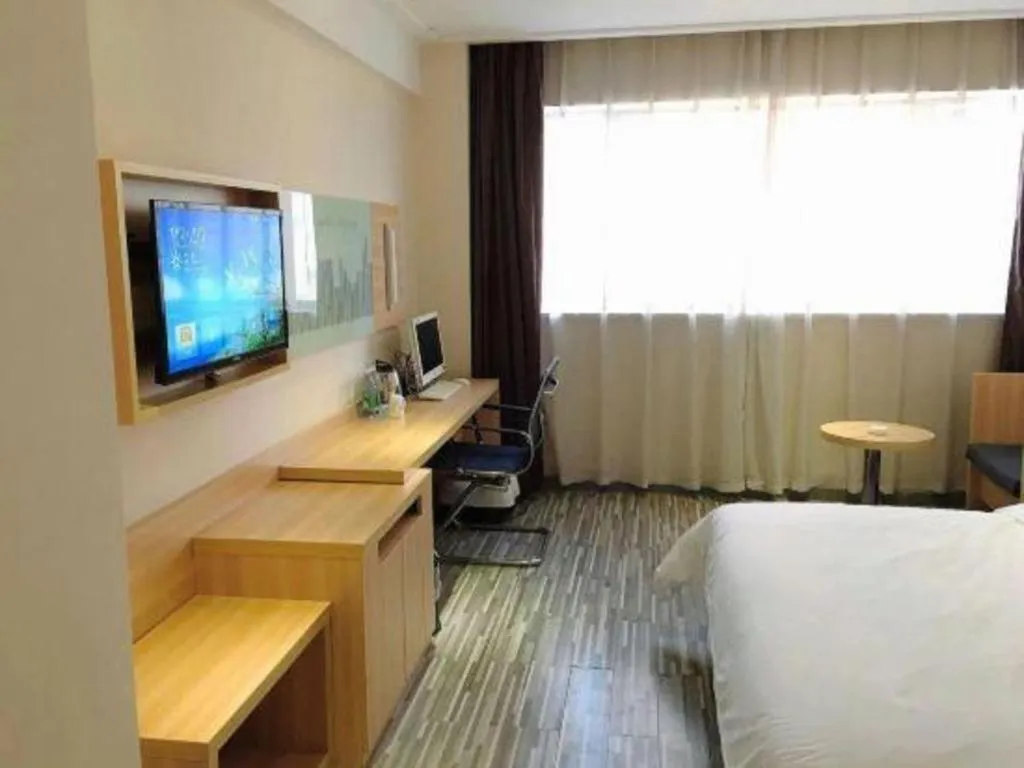 Bed in City Comfort Inn Chibi Railway Station