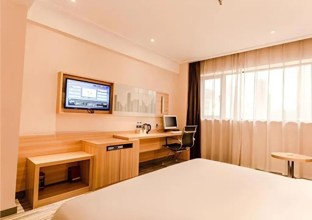 Bed in City Comfort Inn Chibi Railway Station Bed in City Comfort Inn Chibi Railway Station