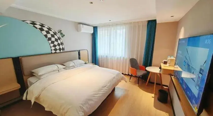 Bed in City Comfort Inn Chibi Railway Station Bed in City Comfort Inn Chibi Railway Station