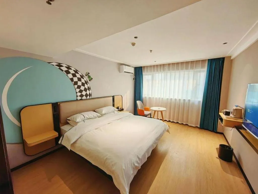 Bed in City Comfort Inn Chibi Railway Station