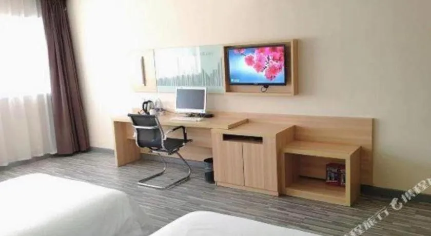 Bed in City Comfort Inn Chibi Railway Station