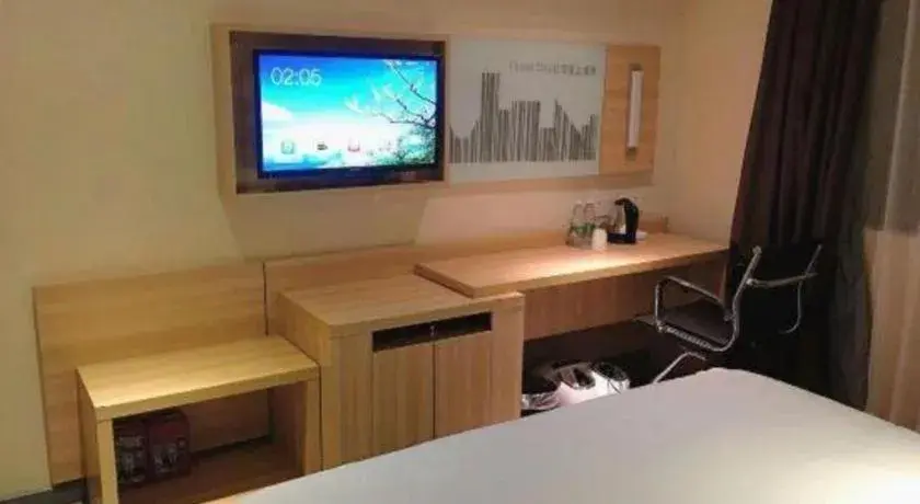 Bed in City Comfort Inn Chibi Railway Station Bed in City Comfort Inn Chibi Railway Station