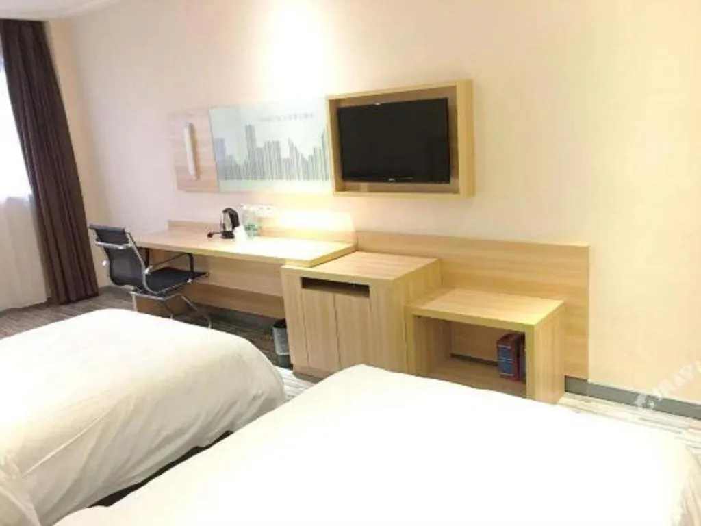 Bed in City Comfort Inn Chibi Railway Station