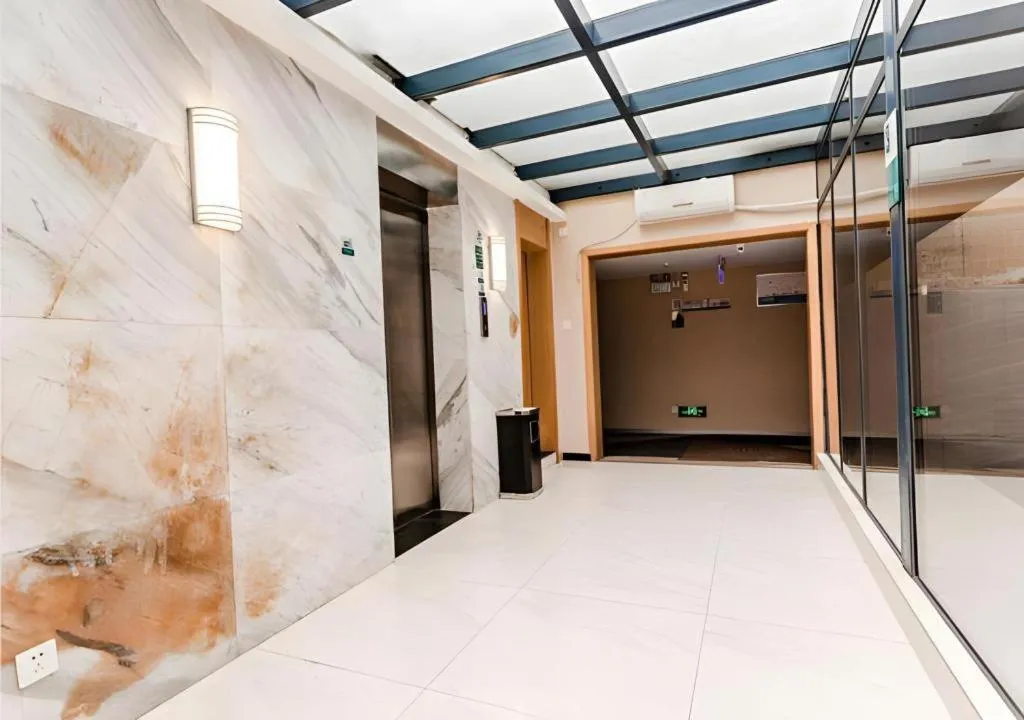 Bed in City Comfort Inn Chibi Railway Station