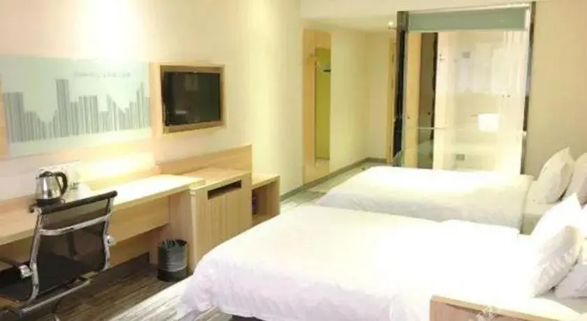 Bed in City Comfort Inn Chibi Railway Station Bed in City Comfort Inn Chibi Railway Station