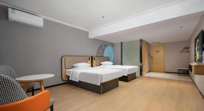 Bed in City Comfort Inn Chibi Railway Station