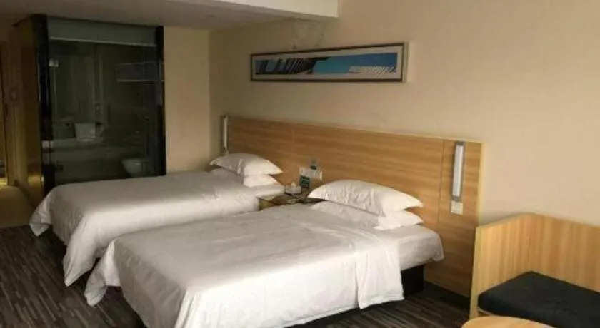 Bed in City Comfort Inn Chibi Railway Station